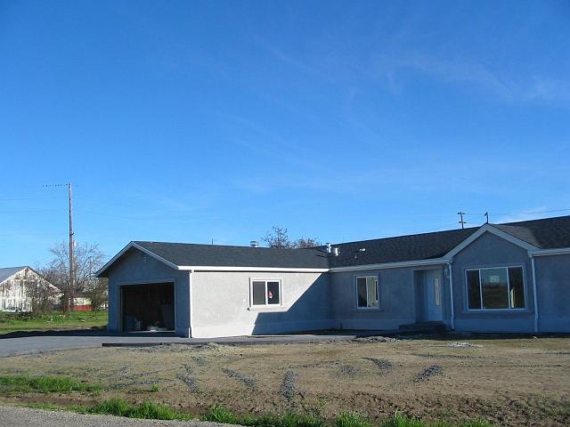 Stucco 12 Here are shots of another home both before and after the stucco finish.